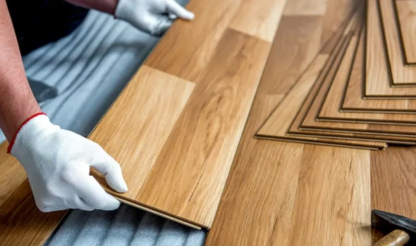 Engineered Wood Flooring by Friendly Build & Fix Friendly Build & Fix installing engineered wood flooring with click-lock system and smooth finish