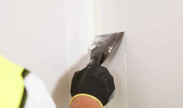 Friendly Build & Fix plastering corner wall as part of detailed plaster and paint service